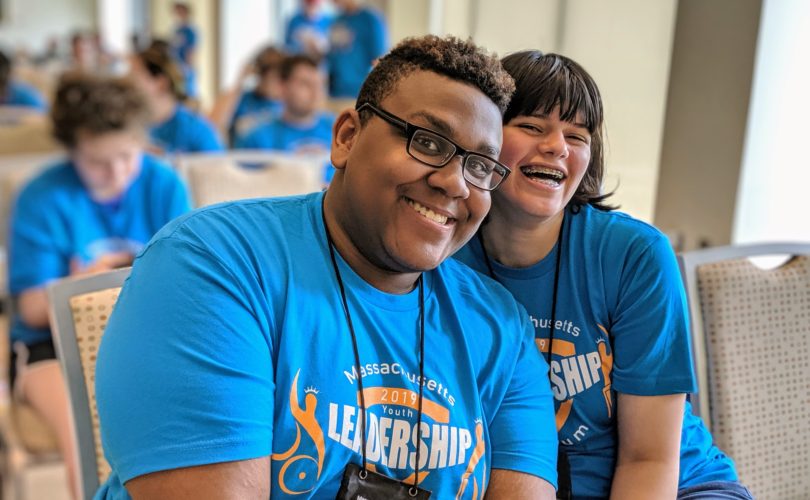 PYD youth TK and Tatiana are laughing wearing YLF t shirts as they attend YLF 2019.