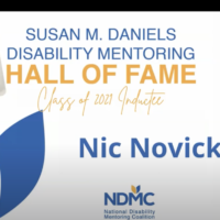 Nic Novicki being inducted