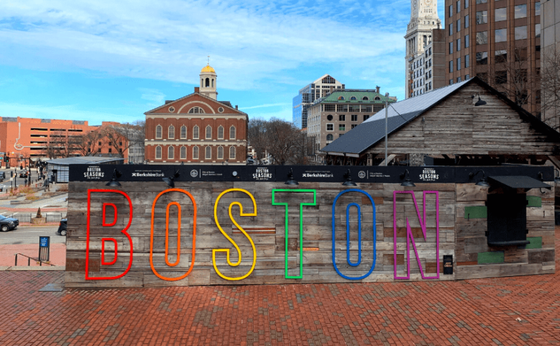 Rainbow letters spelling out "Boston" in the city of Boston