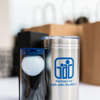 Thermos with PYD logo and golf ball